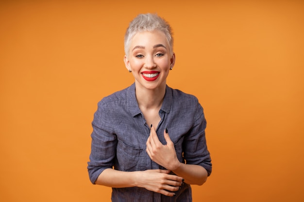 Portrait Of Young Girl With Blond Short Hairstyle Looking At