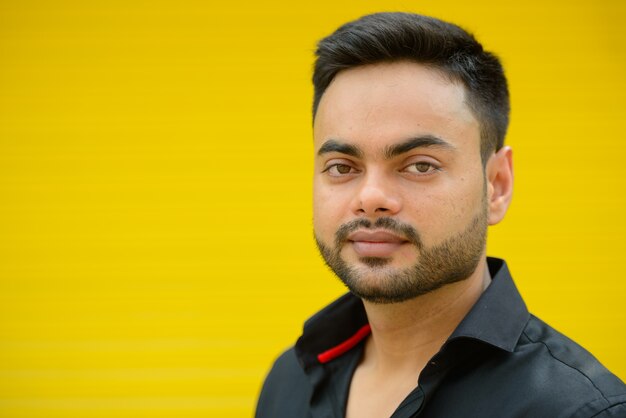 Premium Photo Portrait Of Young Handsome Bearded Indian Businessman