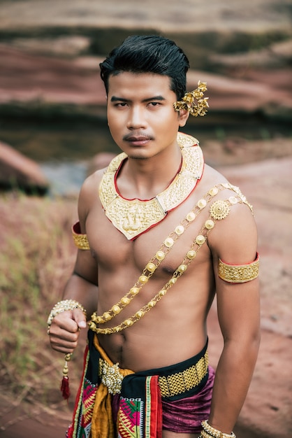 Premium Photo | Portrait of young man in traditional costume posing in ...