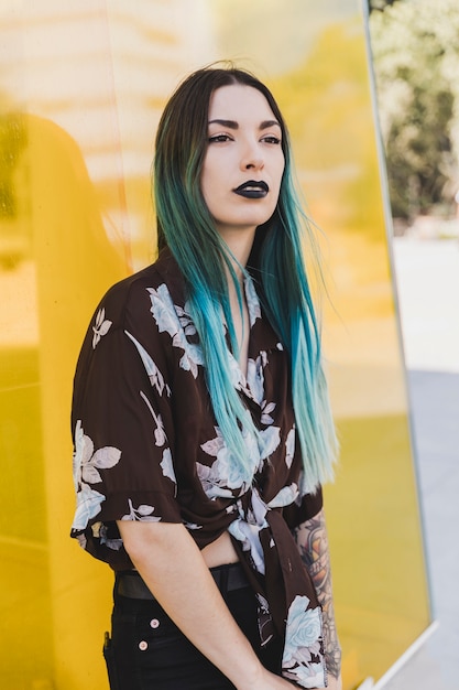 Free Photo | Portrait of young woman with blue dyed hair