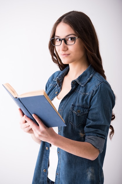 Premium Photo | Portrait of a young woman with book