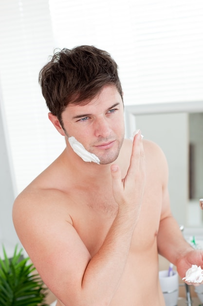 Premium Photo Positive Man Ready To Shave In The Bathroom