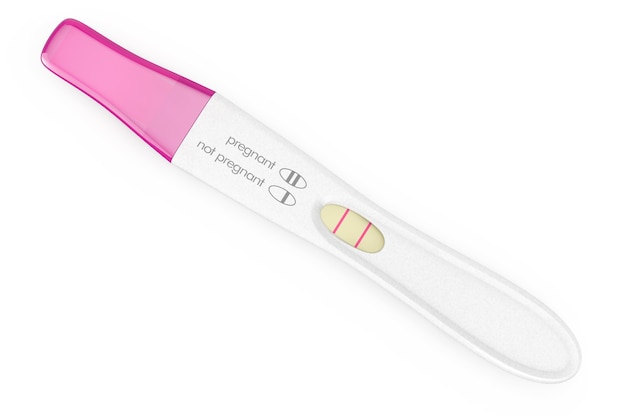 Premium Photo | Positive plastic pregnancy test on a white background ...