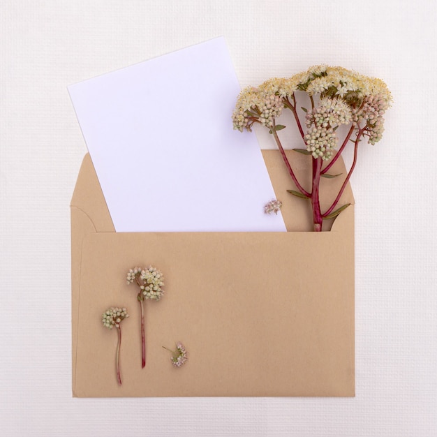 Premium Photo | Postcard with a bouquet of wildflowers in an envelope ...