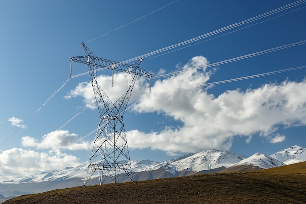 Premium Photo | Power line in the mountains