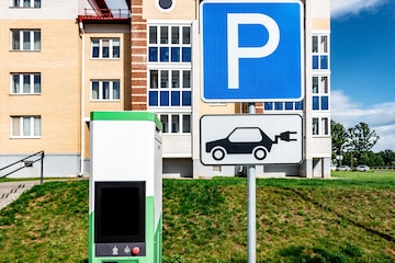 Premium Photo | Power supply for charging of electric car on parking ...