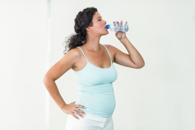 Premium Photo | Pregnant woman drinking water