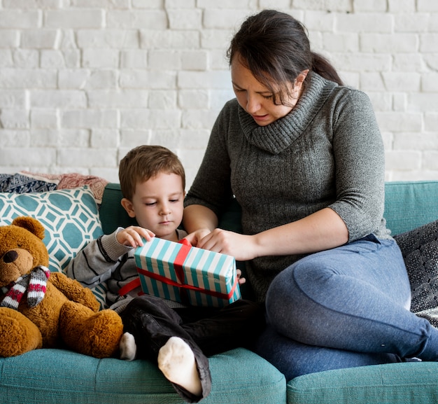 Present gift surprised mom son Premium Photo