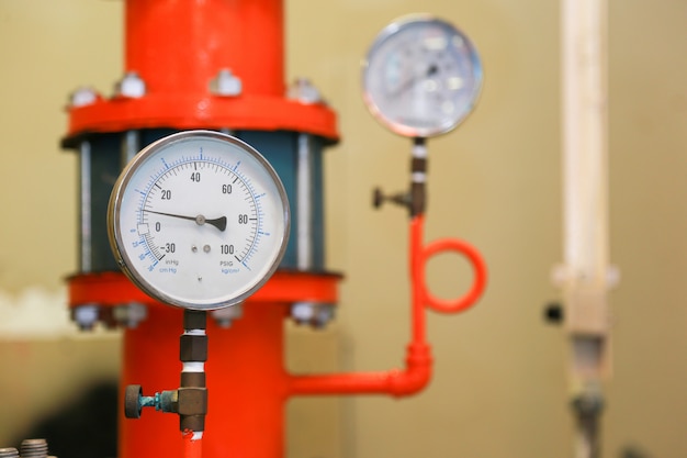 Premium Photo | Pressure gauge psi meter in pipe and valves of fire ...