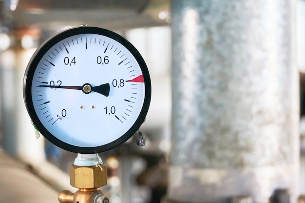 Premium Photo | Pressure gauge showing pressure on the water supply pipe.