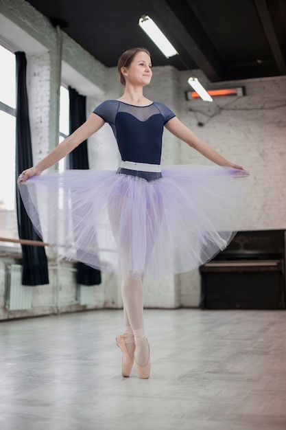 Free Photo | Pretty ballet dancer in studio