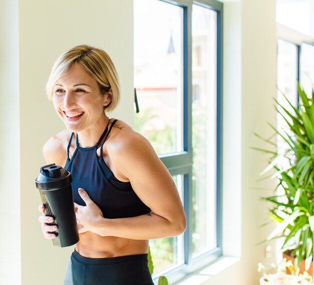 Premium Photo Pretty Blonde Woman Laughing Out Loud At Some Hilarious