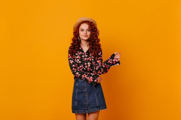 Free Photo | Pretty curly girl in boater, bright blouse and blue skirt ...