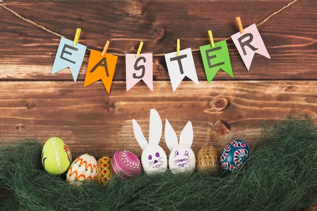 Pretty eggs under easter writing | Free Photo