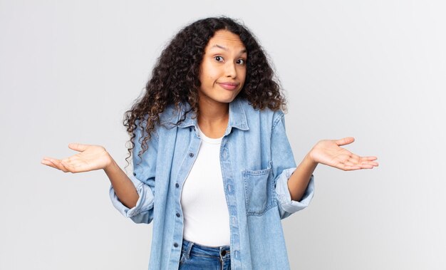 premium-photo-pretty-hispanic-woman-feeling-puzzled-and-confused