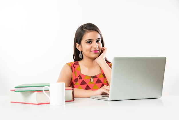 Premium Photo | Pretty indian asian girl studying on laptop computer ...