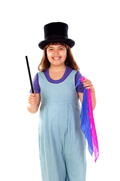 Premium Photo | Pretty little girl doing magic with a top hat and a ...