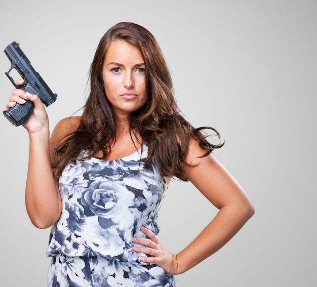 Pretty Mafia Woman Holding A Gun Photo | Free Download