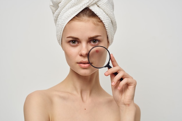 Premium Photo | Pretty woman with magnifying glass near ...