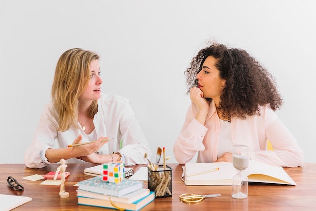 Two female teachers talking