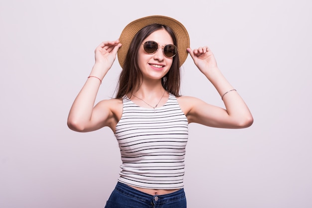 Free Photo | Pretty young woman wearing a hat, sunglasses isolated over ...