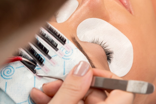 Procedure of eyelashes extension Premium Photo