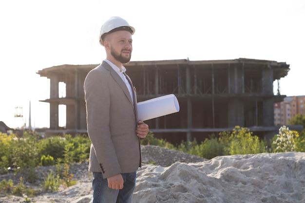 Professional Architecture Standing At Construction Site With