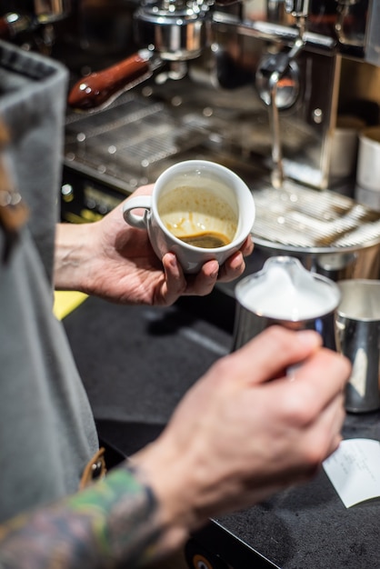 Premium Photo | Professional coffee making in cafe