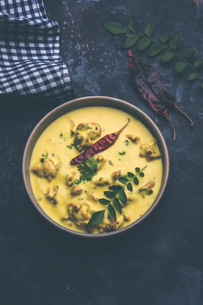 Premium Photo Punjabi Kadhi Pakoda Or Curry Pakora Indian Cuisine Served In A Bowl Or Karahi