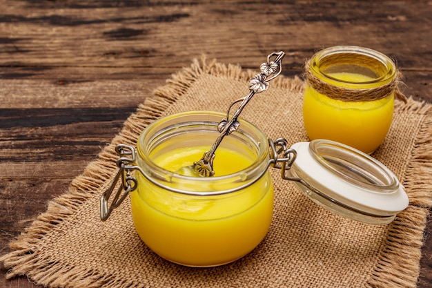 Premium Photo | Pure or desi ghee (ghi), clarified melted butter ...