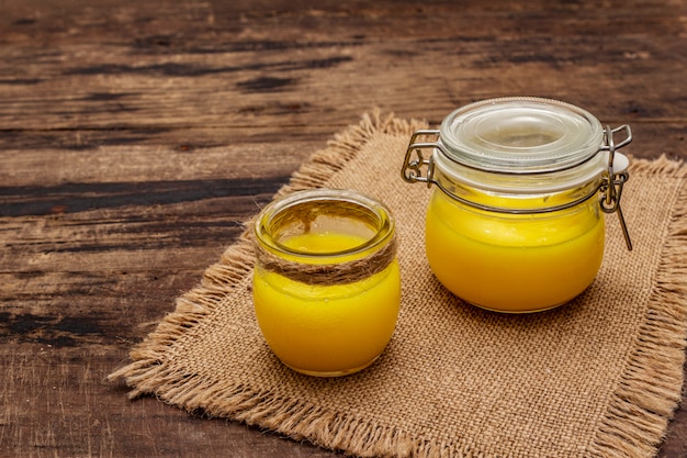 Premium Photo | Pure or desi ghee (ghi), clarified melted butter ...