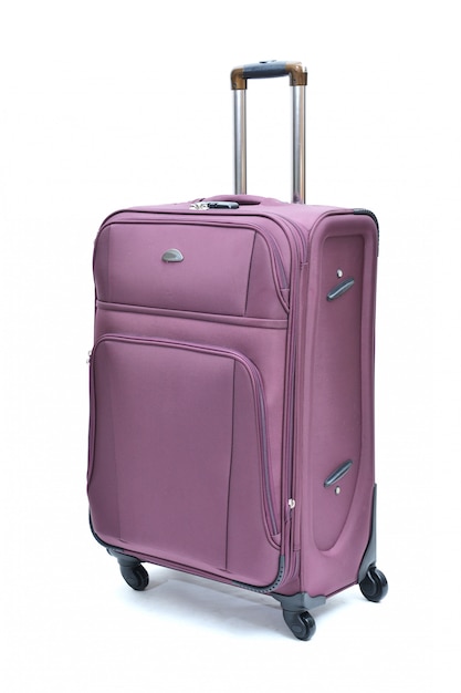 Premium Photo | Purple of modern large suitcase on a white