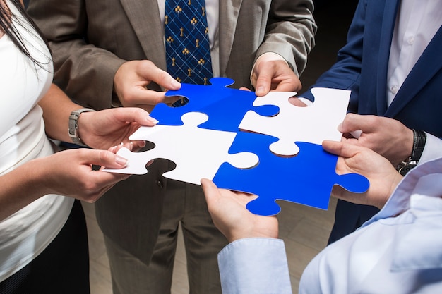 Download Free Puzzle Pieces In Their Hands Premium Photo Use our free logo maker to create a logo and build your brand. Put your logo on business cards, promotional products, or your website for brand visibility.