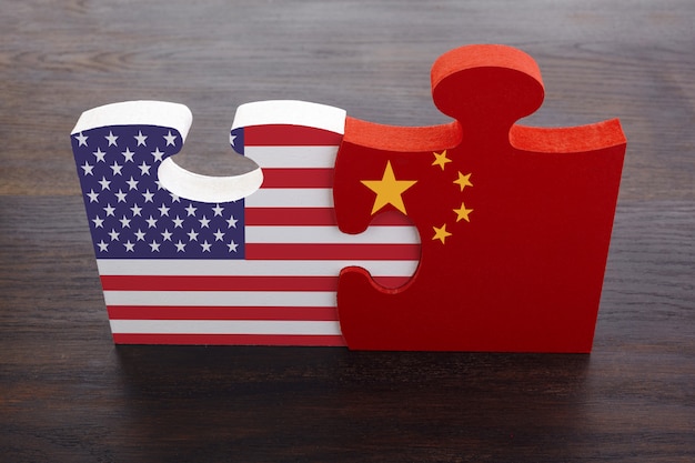 Premium Photo Puzzle Pieces With The Flags Of China And The Usa