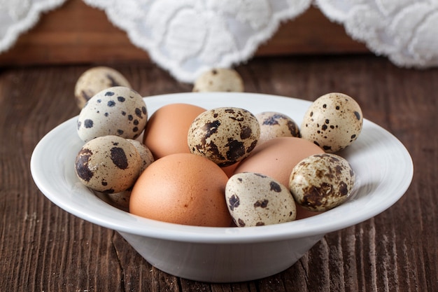 Premium Photo | Quail and chicken eggs