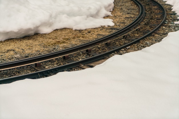 Railway track on snow Free Photo