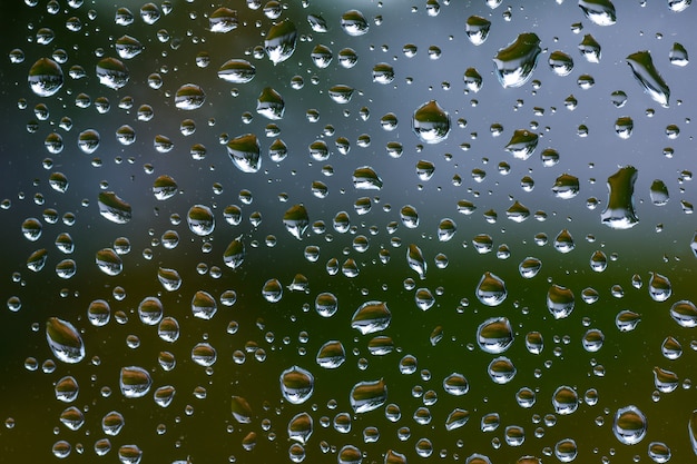 Premium Photo | Rain drops on the glass, texture, copy space