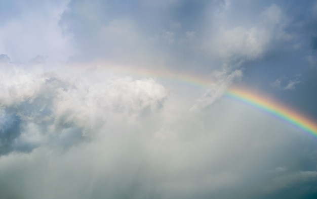 Premium Photo | Rainbow on sky rainy day