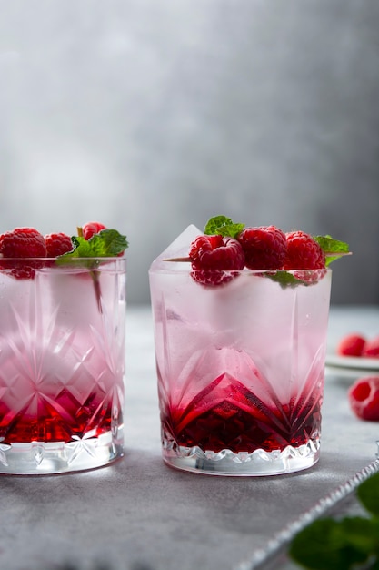 Premium Photo | Raspberry cold drink cocktail with mint leaf and ice ...