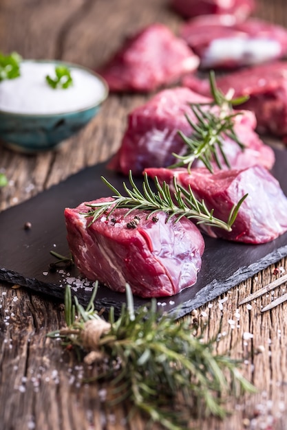 Premium Photo Raw Beef Tenderloin Steak On A Cutting Board With Rosemary Pepper Salt In Other 