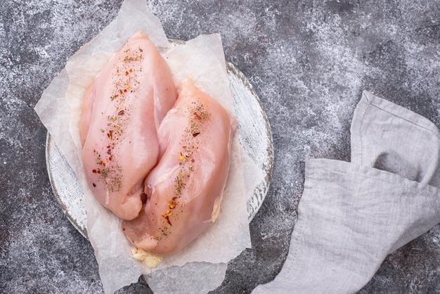 Premium Photo Raw Chicken Fillet On Cutting Board