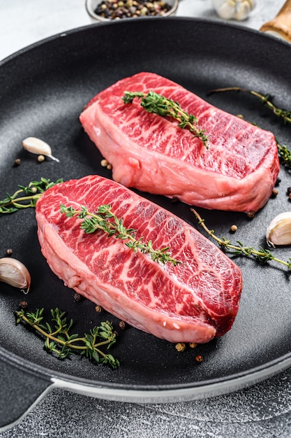 Premium Photo | Raw marbled beef steak, top blade meat steak