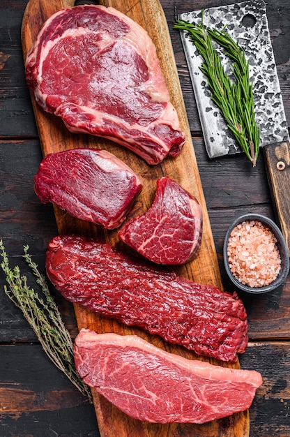 Premium Photo | Raw prime black angus beef steaks fillet mignon, rib ...