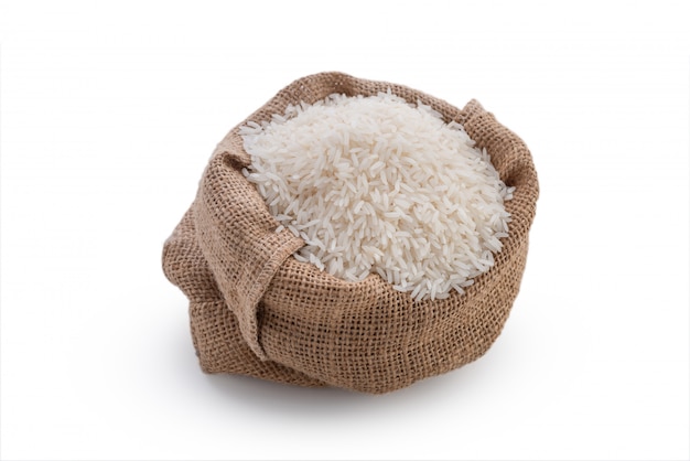 Raw rice in sack on white background | Premium Photo