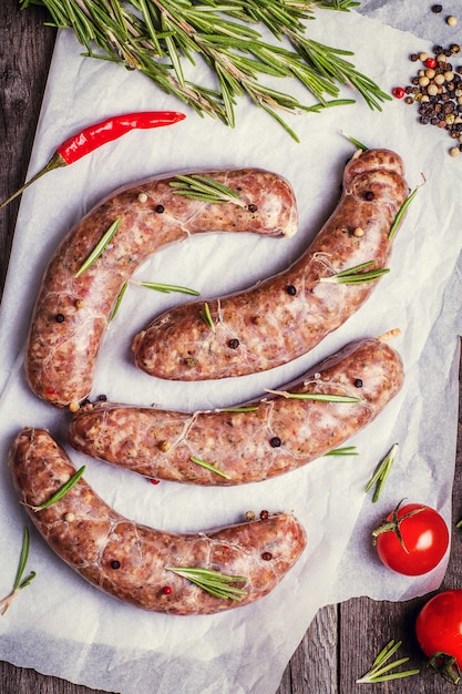 Premium Photo | Raw sausage of beef and pork with spices