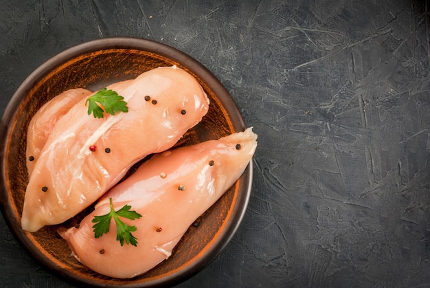 premium-photo-raw-uncooked-chicken-breast