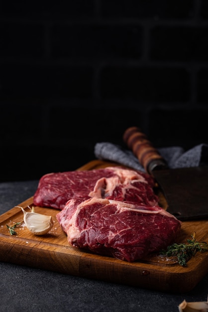 Premium Photo Raw Uncooked Rib Eye Steak