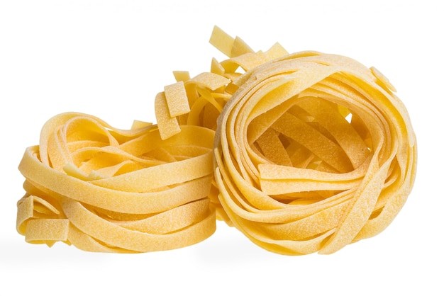 Download Premium Photo Raw Yellow Three Tagliatelle Or Fettuccine Pasta Isolated Focus Stacking Close Up Macro Dof PSD Mockup Templates