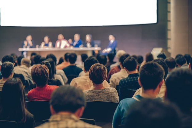 Premium Photo | Rear view of audience in the conference hall or seminar ...