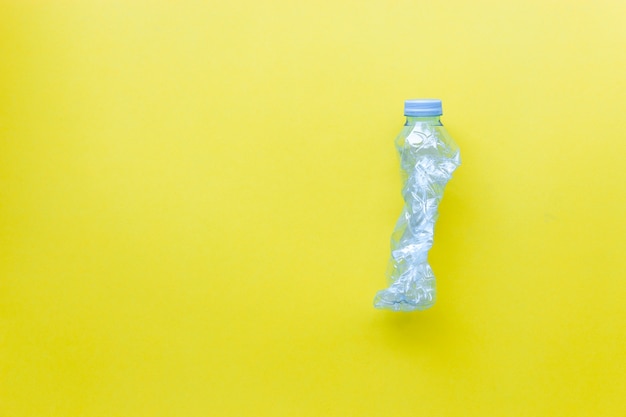 Download Premium Photo Recycle Plastic Bottles On Yellow Color Background Yellowimages Mockups